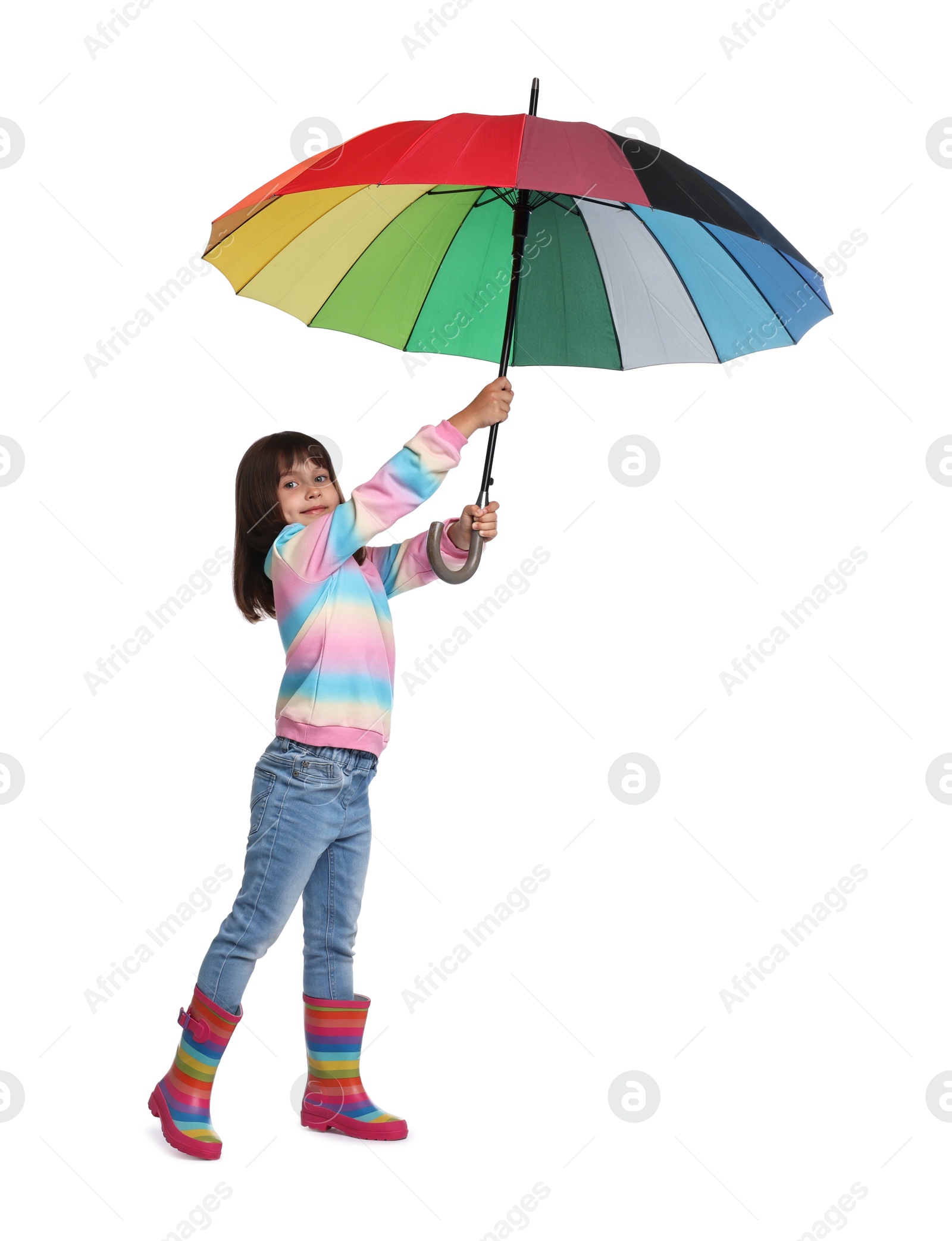 Photo of Cute little girl with colorful umbrella on white background