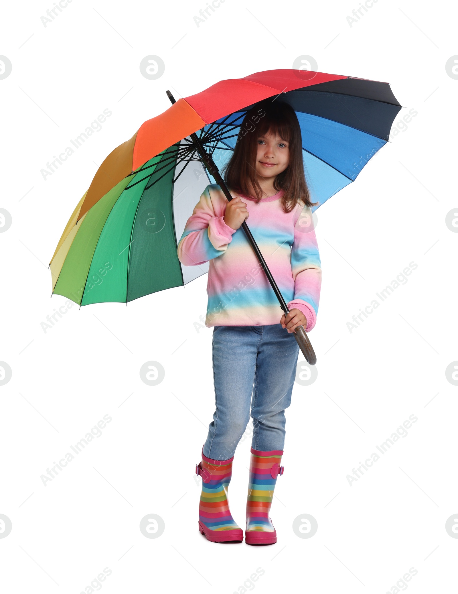 Photo of Cute little girl with colorful umbrella on white background