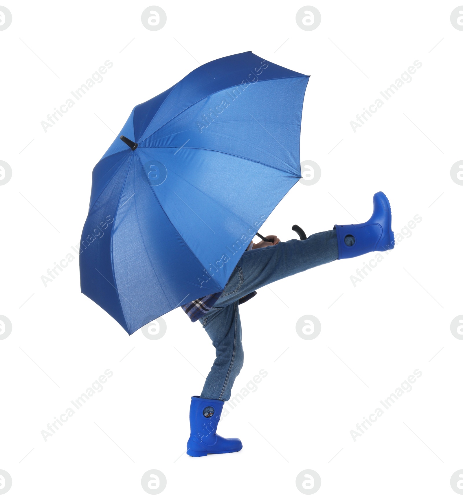 Photo of Little boy with blue umbrella on white background