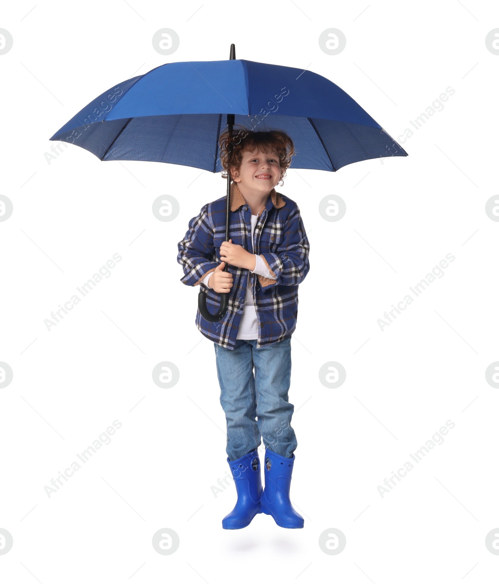 Photo of Little boy with blue umbrella on white background