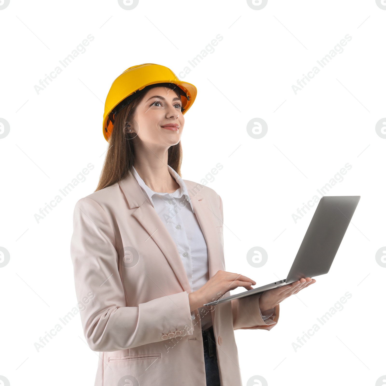 Photo of Engineer in hard hat with laptop on white background