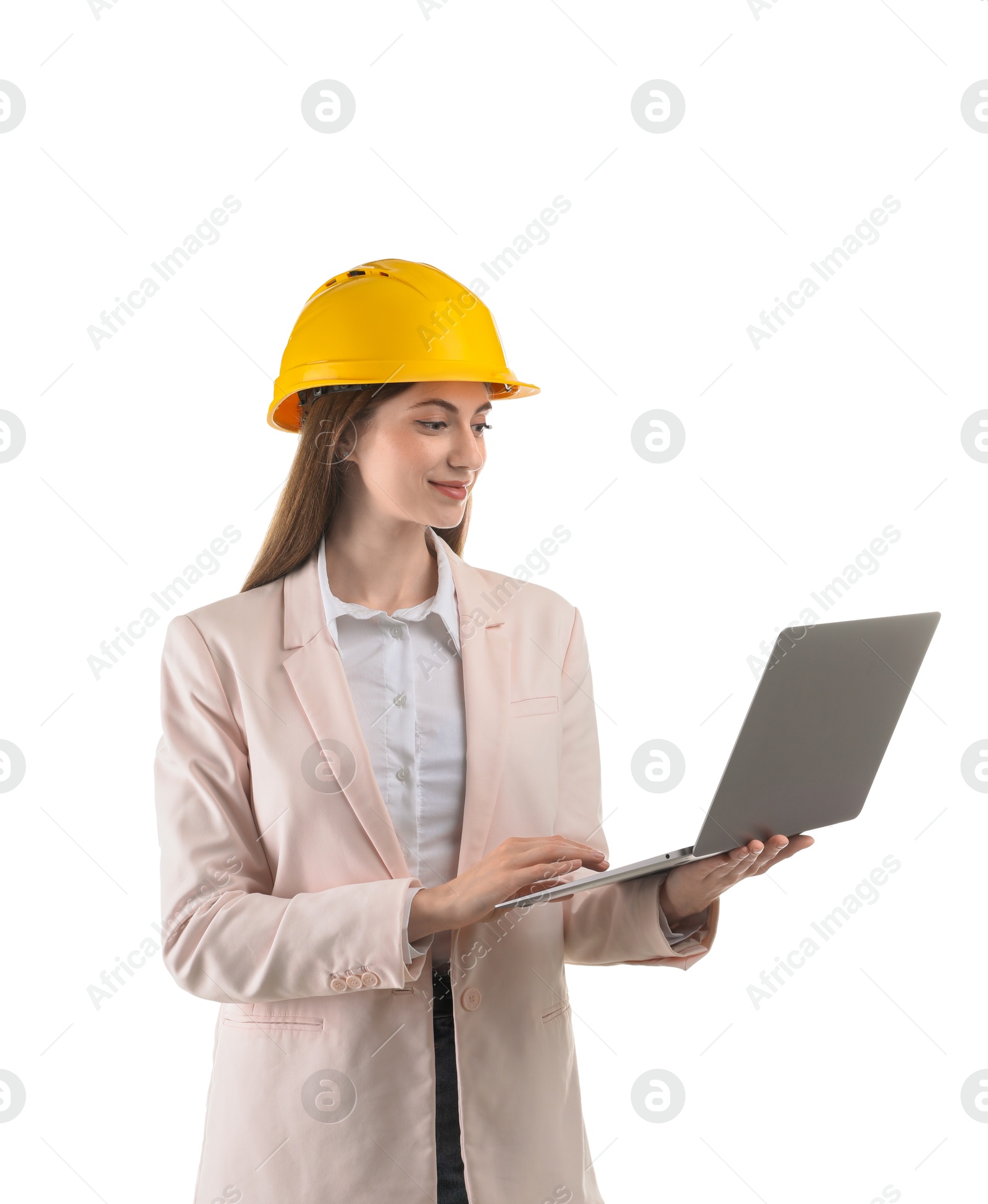 Photo of Engineer in hard hat with laptop on white background