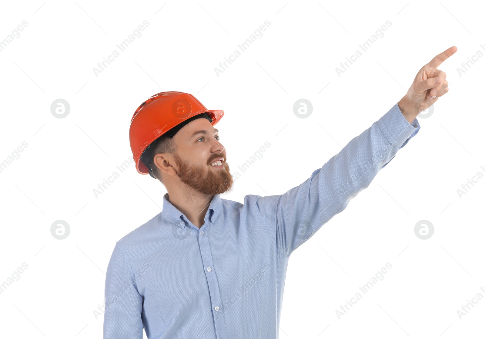 Photo of Engineer in hard hat pointing at something on white background