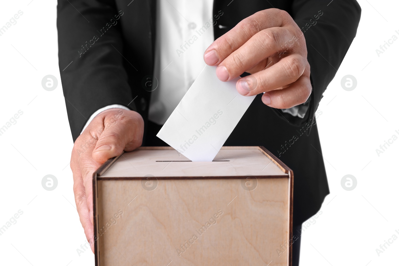 Photo of Man putting his vote into ballot box against white background, closeup