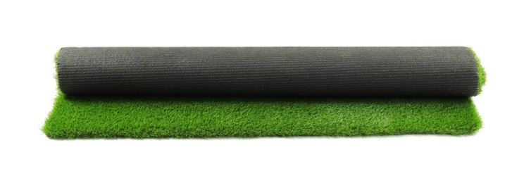 Photo of Roll of green artificial grass isolated on white