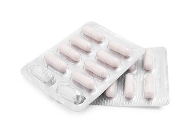 Photo of Antibiotic pills in blisters isolated on white