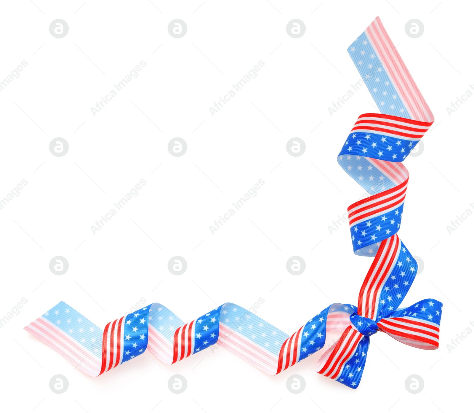 Photo of Ribbon bow with American flag pattern isolated on white, top view