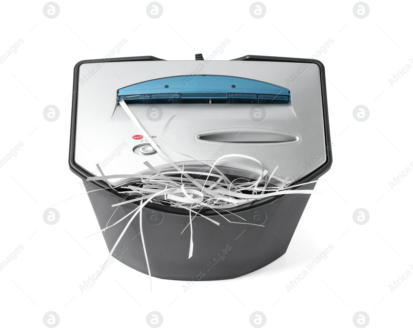 Photo of Shredder with paper strips isolated on white