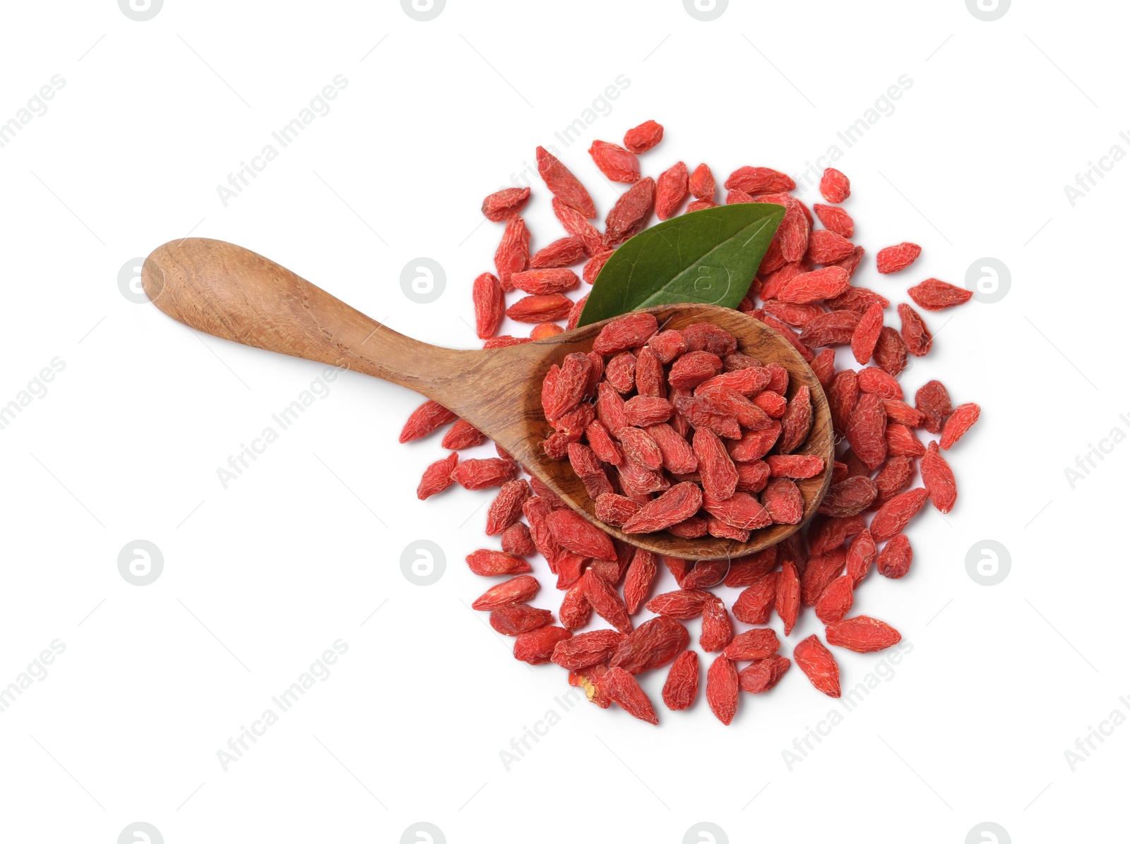 Photo of Dried goji berries, green leaf and wooden spoon isolated on white, top view