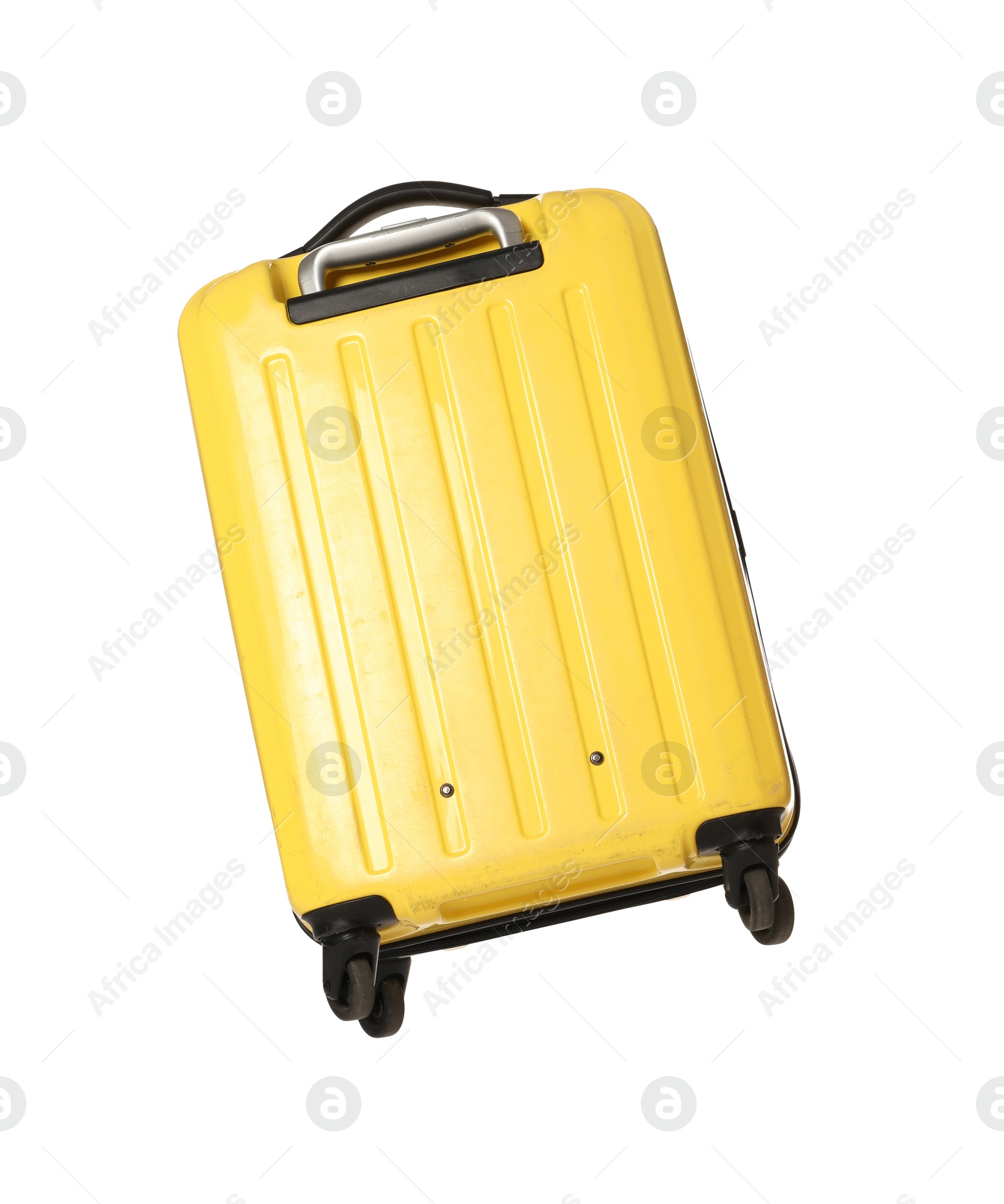 Photo of One new yellow suitcase isolated on white