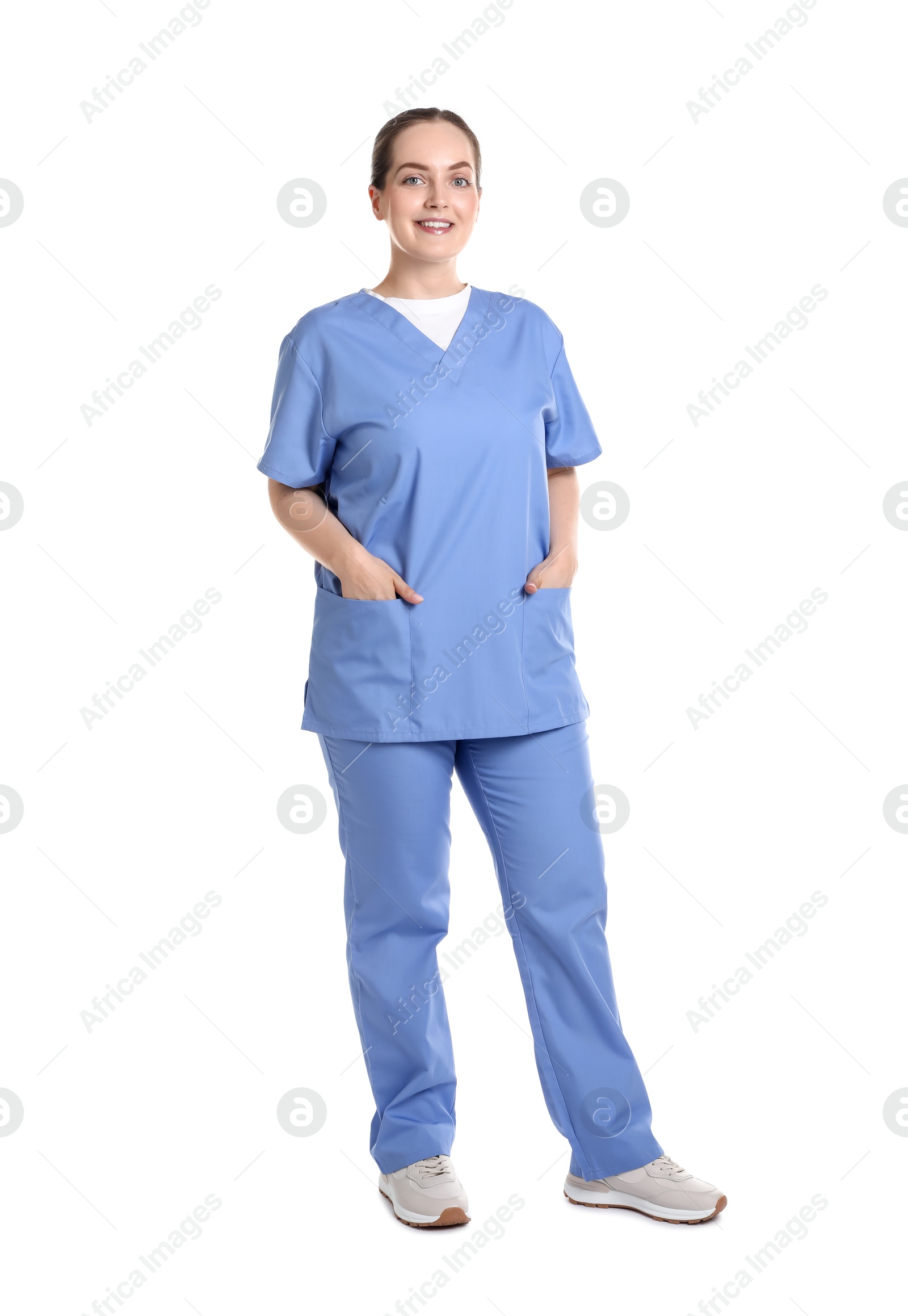 Photo of Full length portrait of professional nurse in uniform on white background