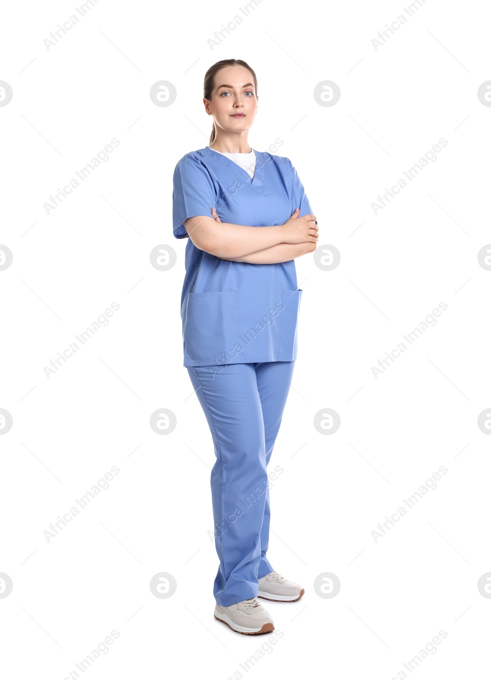 Photo of Full length portrait of professional nurse in uniform on white background