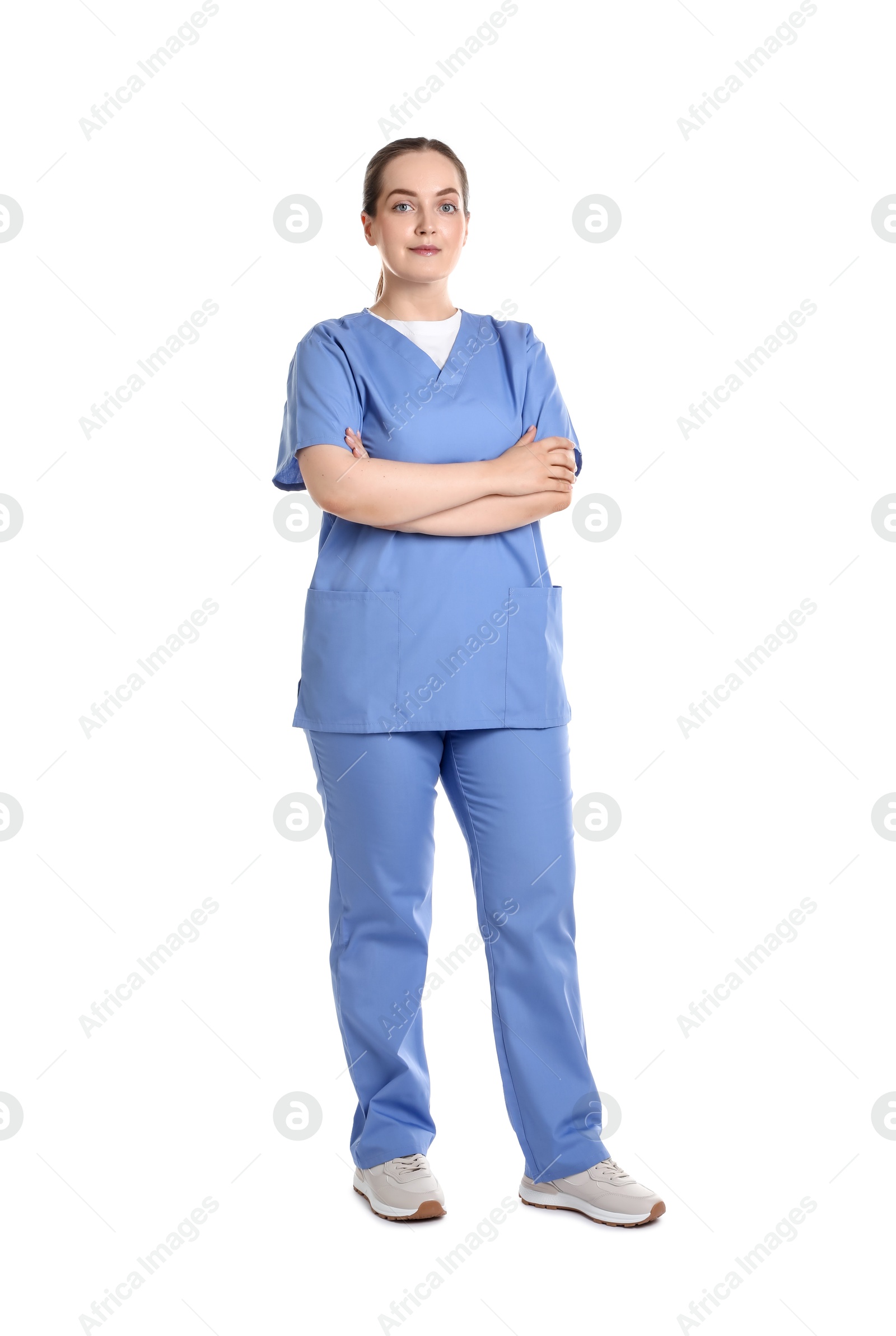 Photo of Full length portrait of professional nurse in uniform on white background