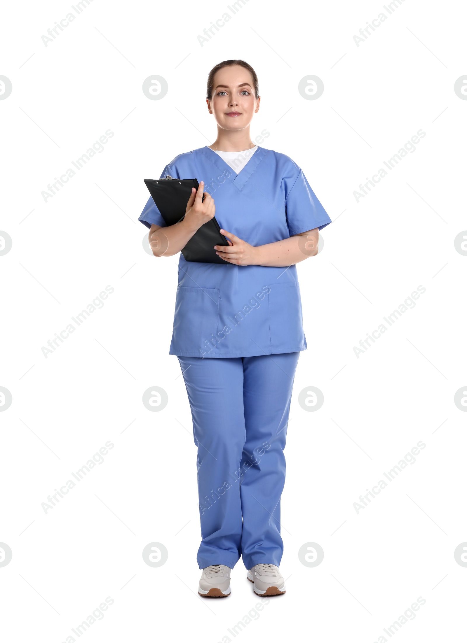 Photo of Professional nurse with clipboard on white background