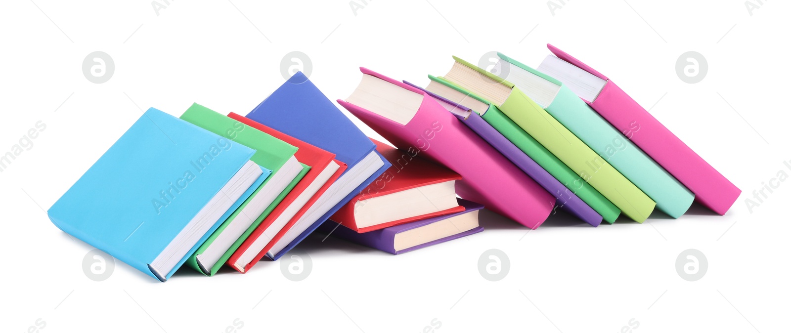 Photo of Many bright colorful books isolated on white