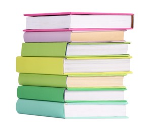 Photo of Stack of colorful books isolated on white