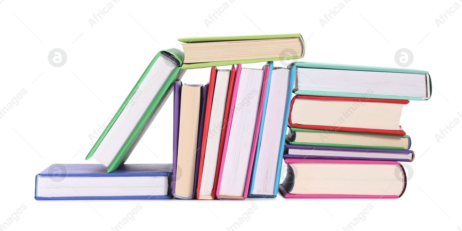 Photo of Many bright colorful books isolated on white