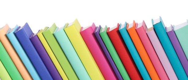 Many bright colorful books against white background