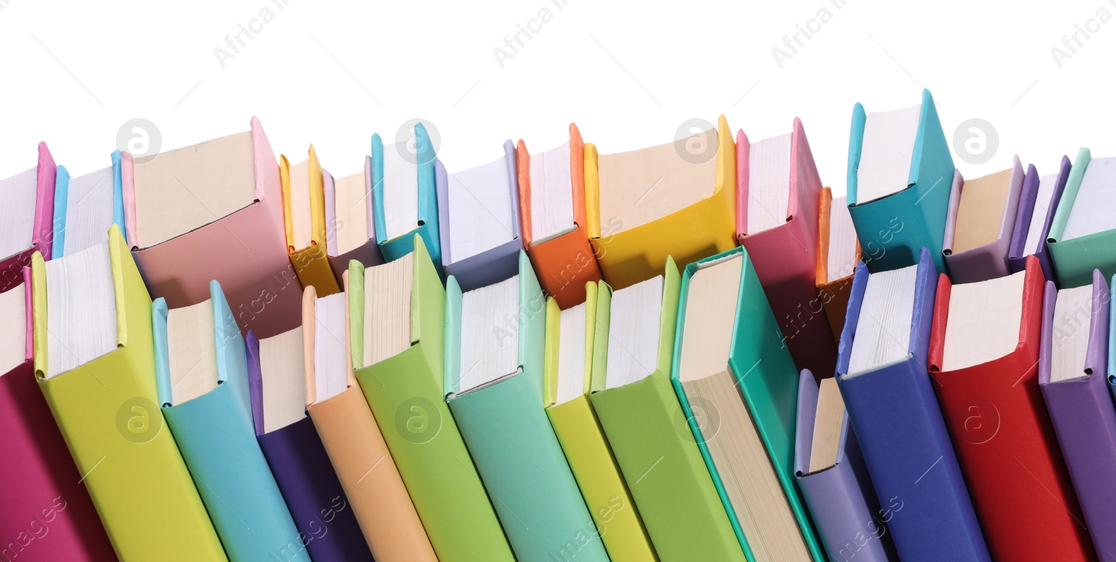 Photo of Many bright colorful books against white background