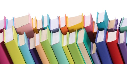 Many bright colorful books against white background