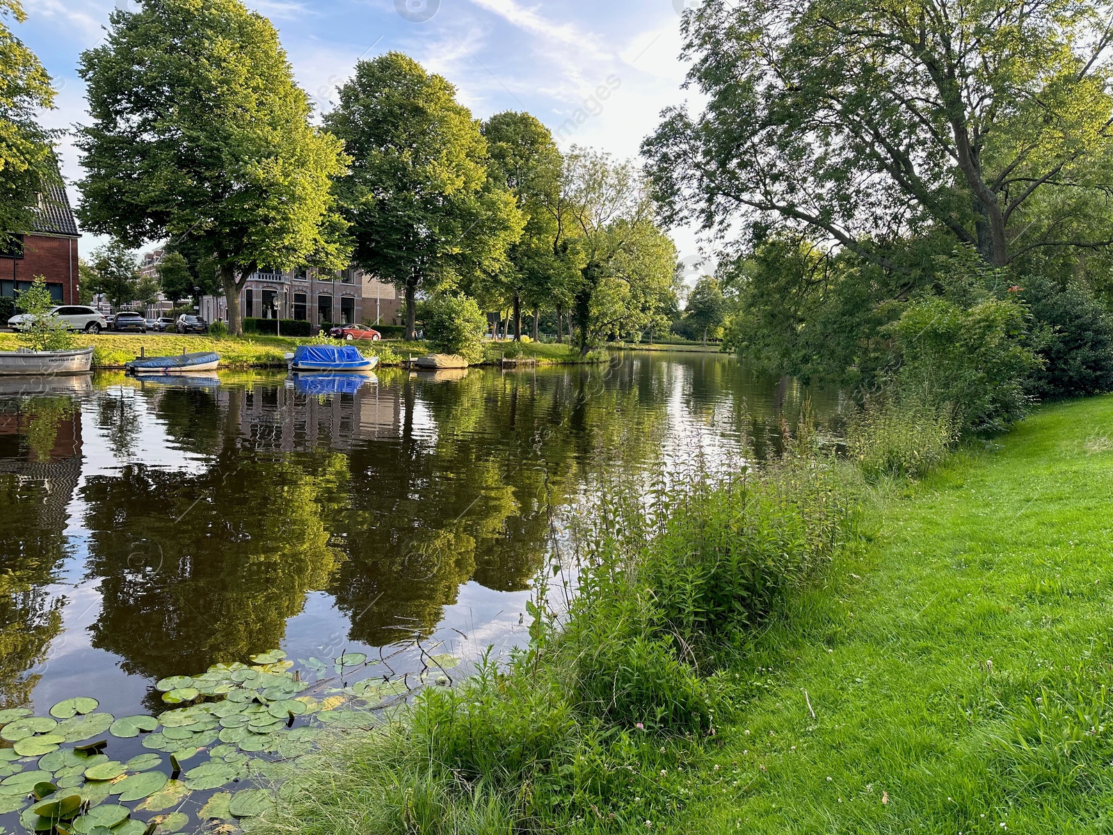 Photo of Picturesque view of canal with moored boats