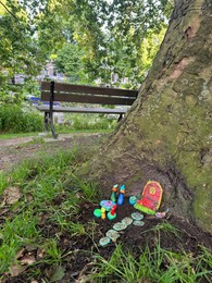 Photo of Beautiful gnome`s house under tree outdoors. Dutch tradition