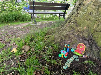 Photo of Beautiful gnome`s house under tree outdoors. Dutch tradition