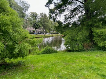 Photo of Picturesque view of canal and trees outdoors