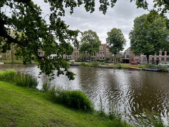 Photo of Picturesque view of canal with moored boats