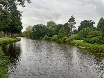 Photo of Picturesque view of canal among trees outdoors