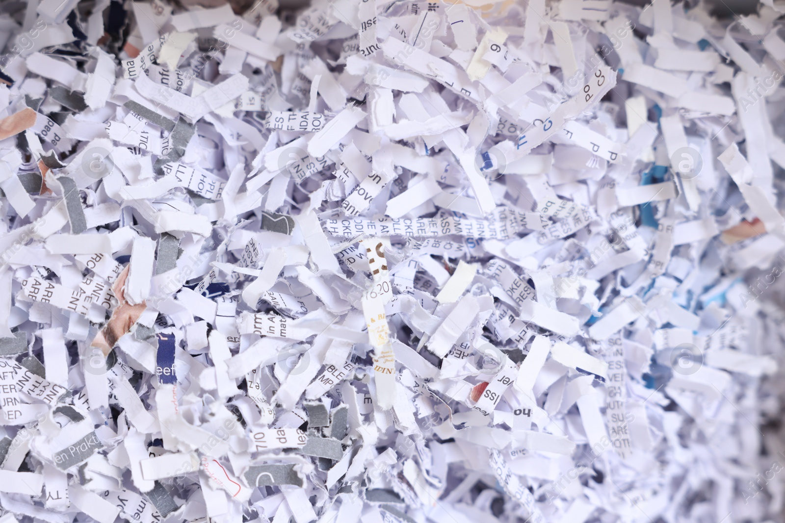 Photo of Pile of shredded paper strips, closeup view