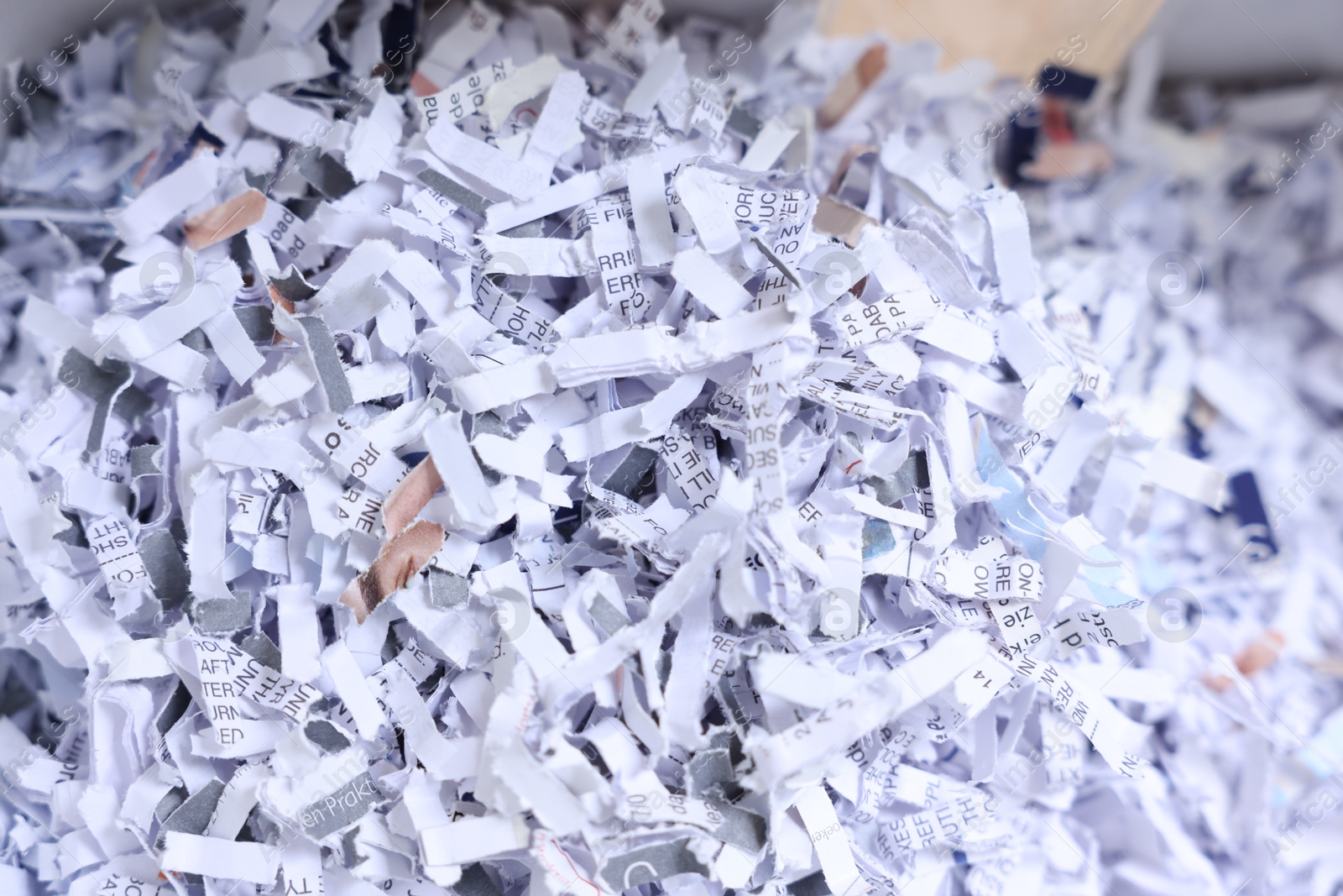 Photo of Pile of shredded paper strips, closeup view