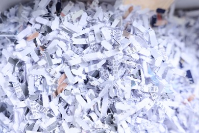 Photo of Pile of shredded paper strips, closeup view