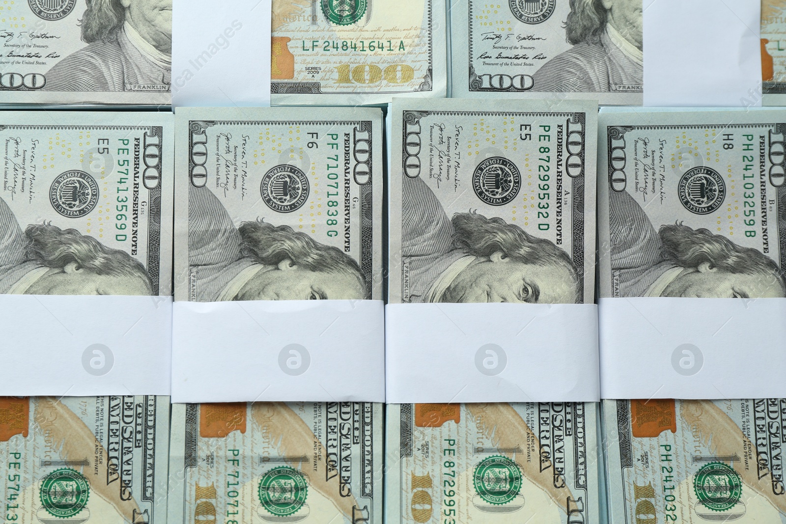 Photo of Many dollar banknotes as background, top view