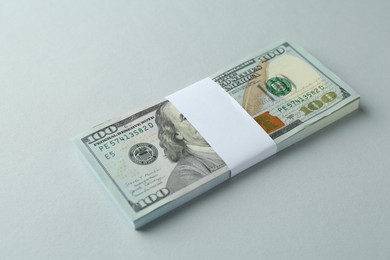 Photo of Dollar banknotes on grey background. American currency