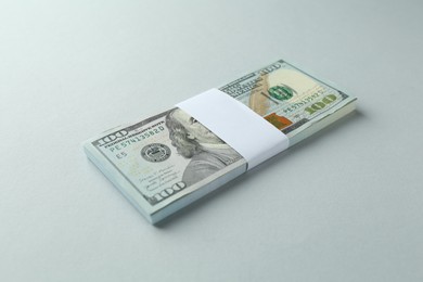 Photo of Dollar banknotes on grey background. American currency