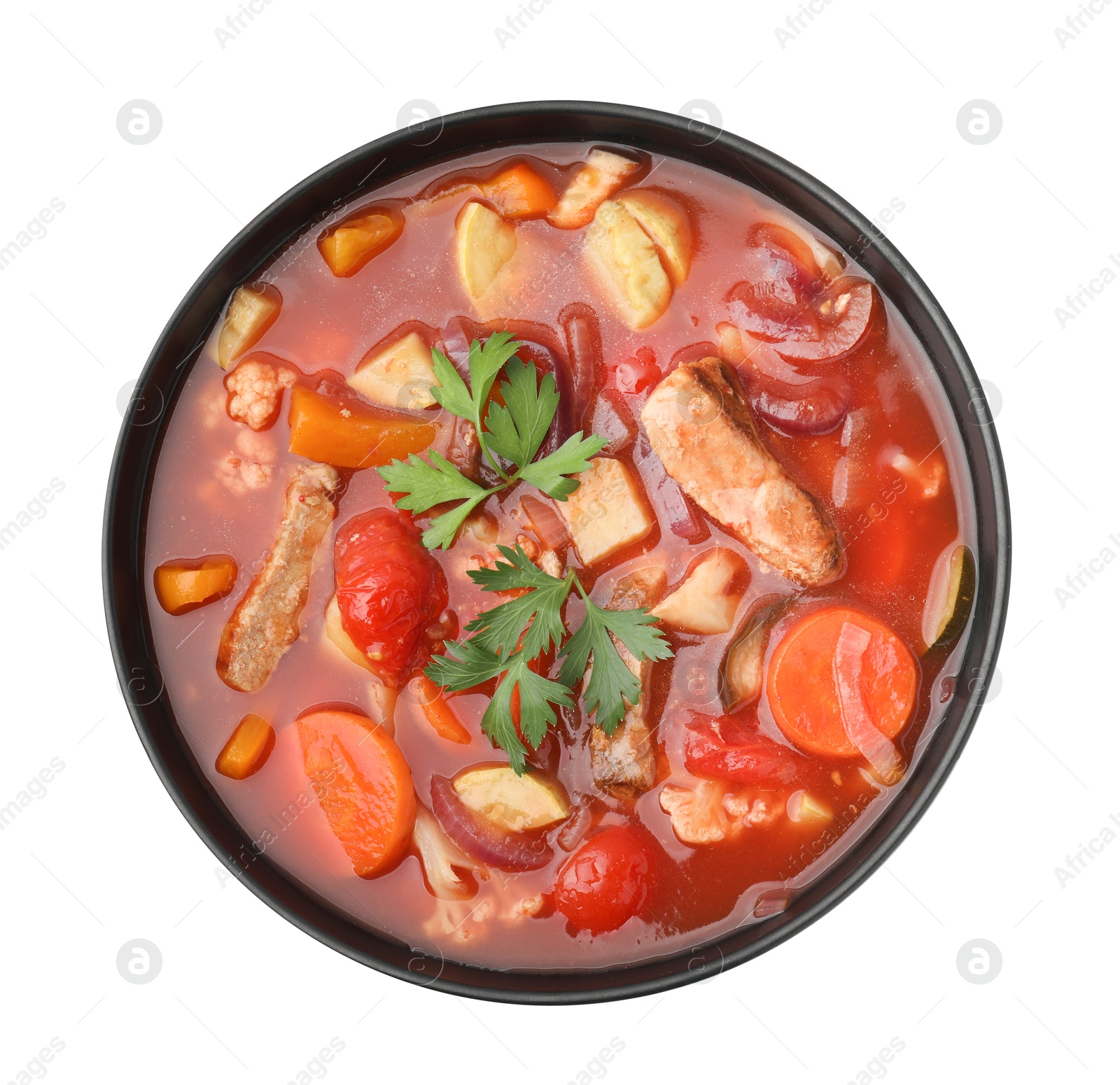 Photo of Tasty homemade stew with vegetables in bowl isolated on white, top view