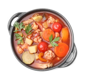 Photo of Tasty homemade stew with vegetables in dish isolated on white, top view