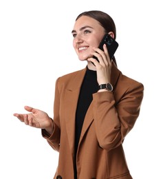 Beautiful woman in brown jacket talking on smartphone against white background