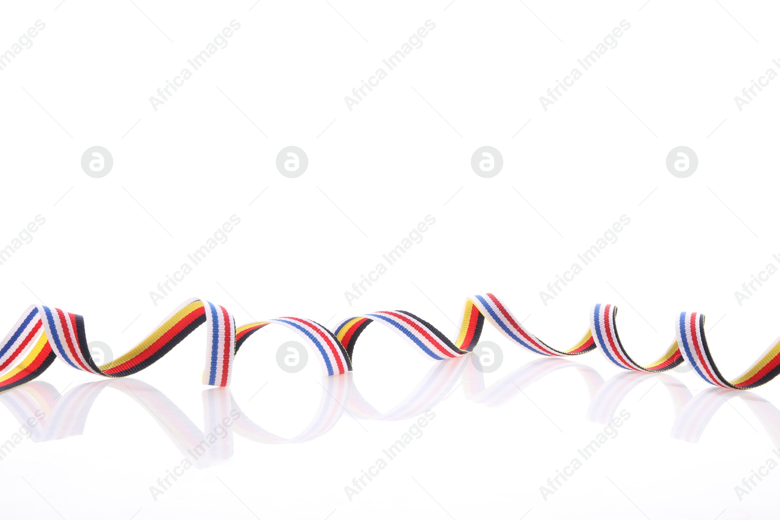 Photo of Ribbons in colors of different flags isolated on white