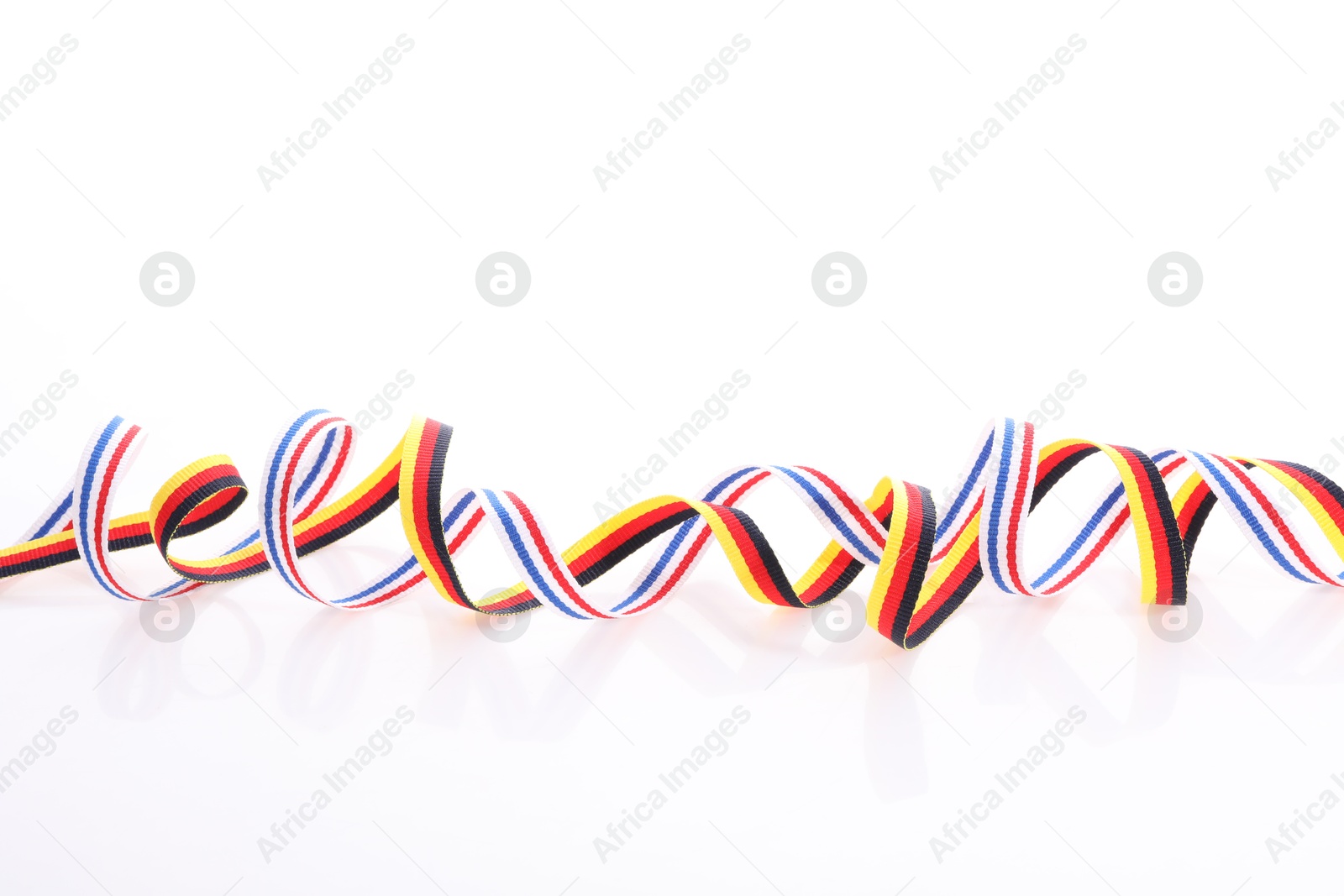 Photo of Ribbons in colors of different flags isolated on white