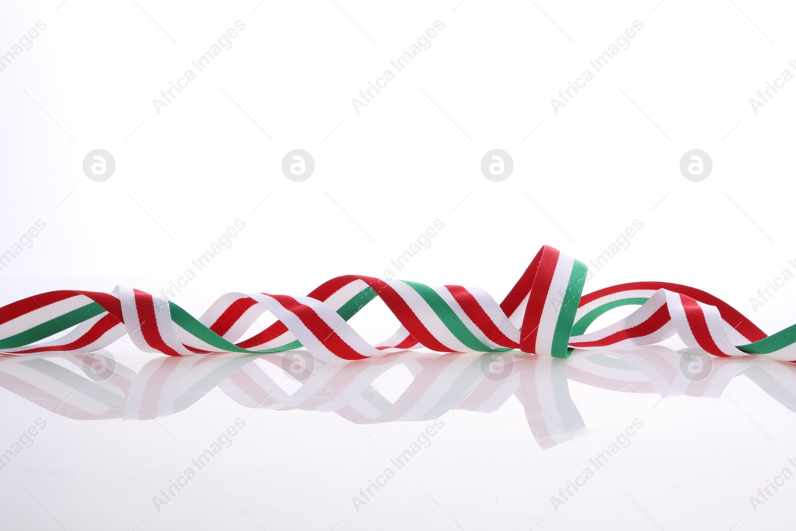 Photo of Ribbon in colors of Hungarian flag isolated on white