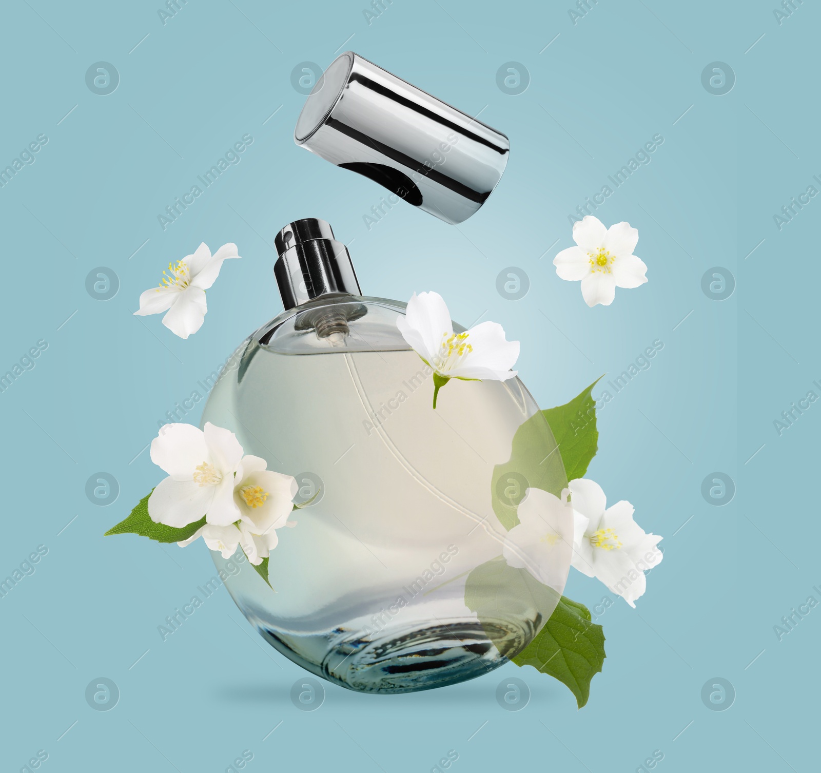 Image of Bottle of floral perfume and jasmine flowers in air on light blue background