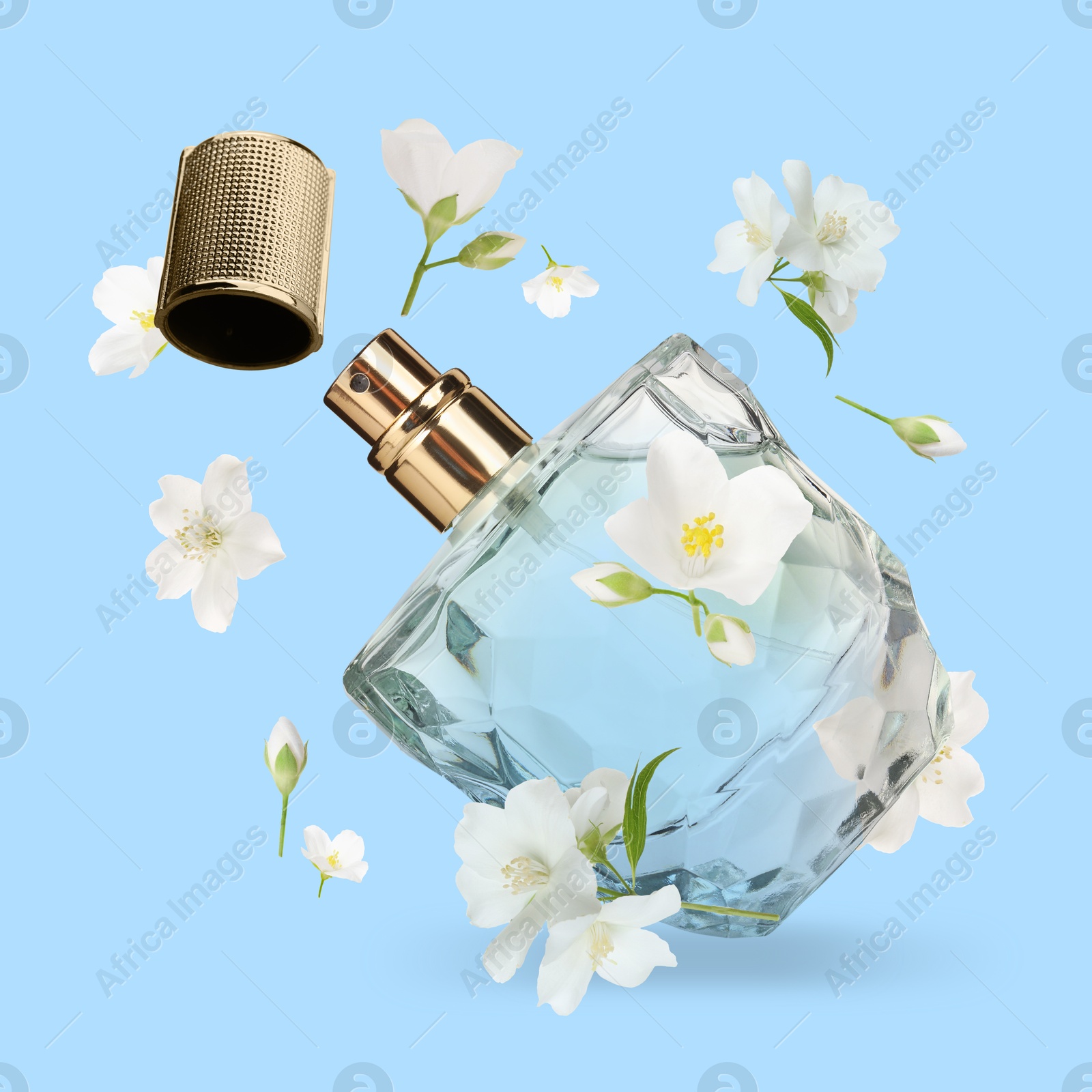 Image of Bottle of floral perfume and jasmine flowers in air on light blue background