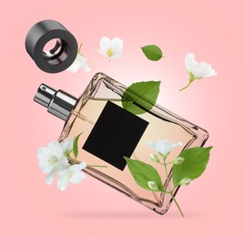 Image of Bottle of floral perfume and jasmine flowers in air on pink background