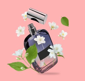 Image of Bottle of floral perfume and jasmine flowers in air on pink background