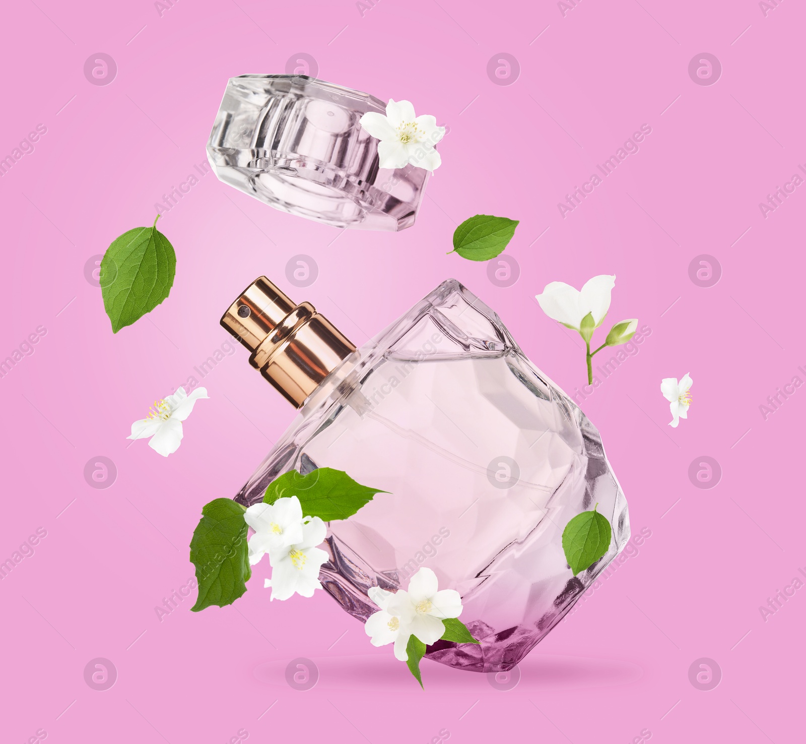 Image of Bottle of floral perfume and jasmine flowers in air on pink background