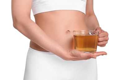 Photo of Weight loss concept. Woman with cup of diet tea on white background, closeup