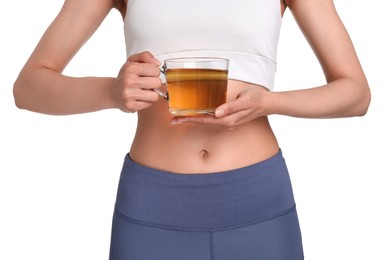 Photo of Weight loss concept. Woman with cup of diet tea on white background, closeup