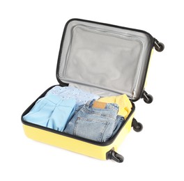 Photo of Open suitcase with clothes packed for travelling isolated on white